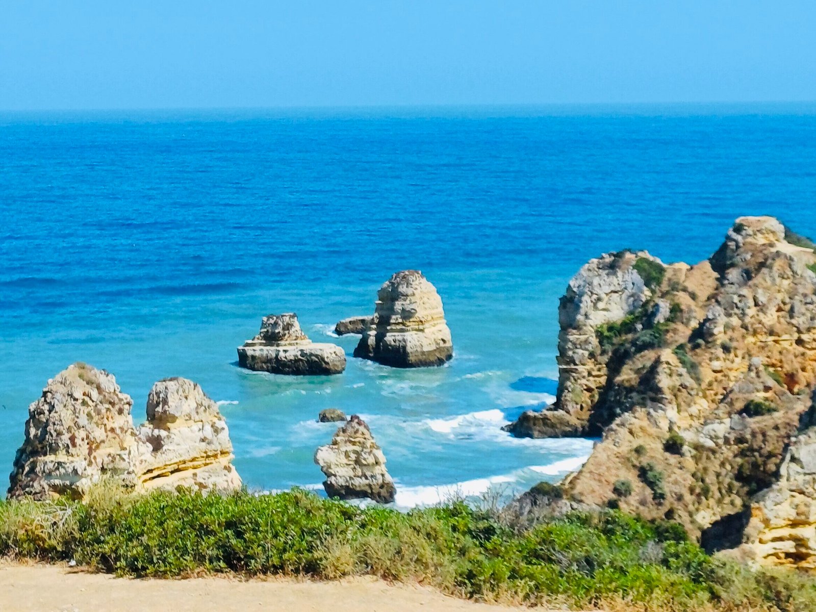 Stunning view from Ponta da Piedade in Algarve coast, showcasing the blue ocean and rocky formations