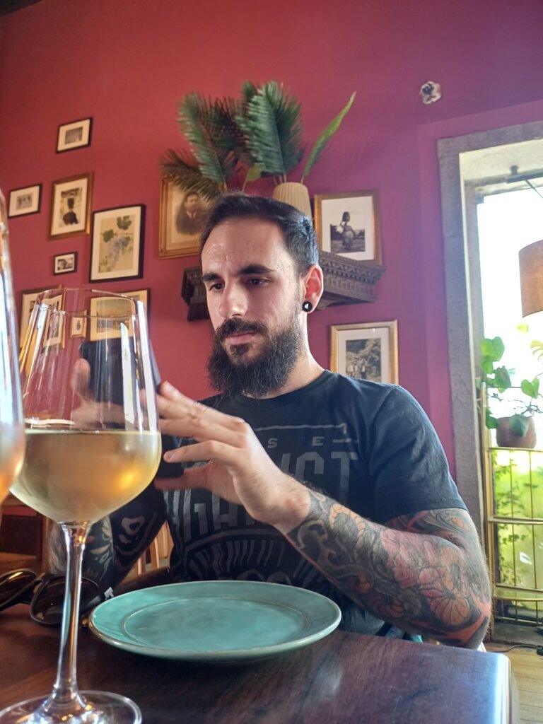 man enjoying wine at Capela Incomum