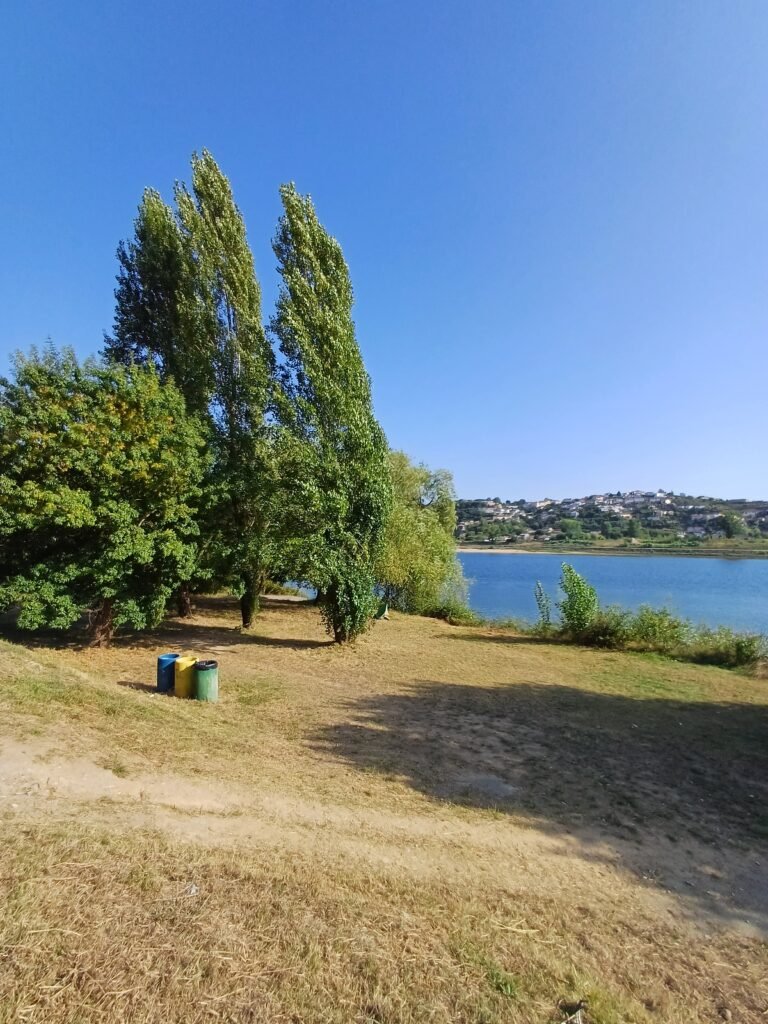 bins in the grass close to Praia Fluvial de Gramido