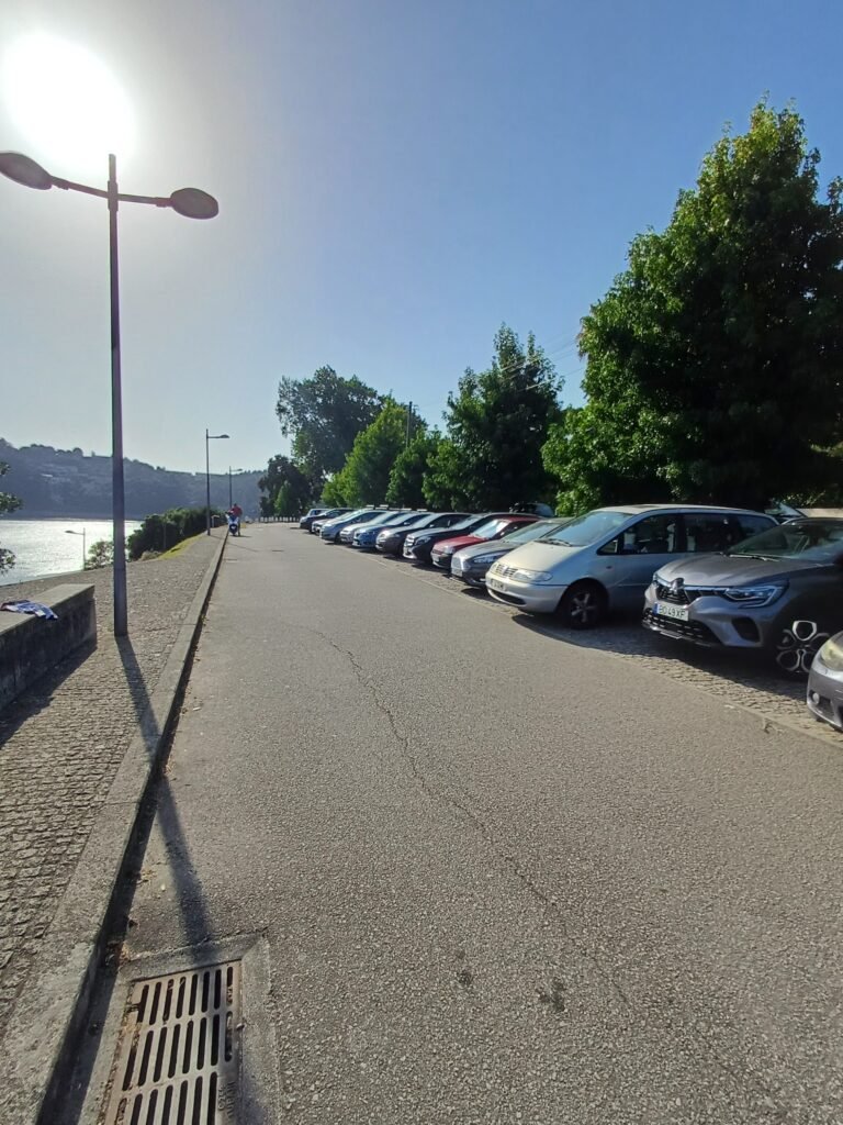 Cars parked in the Parking area near Praia Fluvial de Gramido