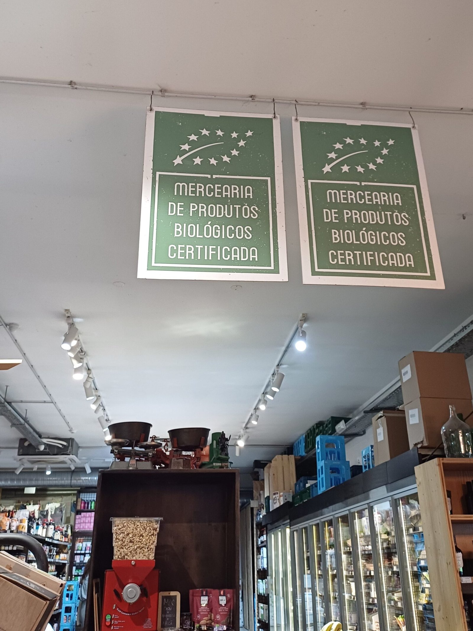 Sign indicating that the grocery store is bio certified - Mercearia de Produtos Biológicos Certificada, highlighting its commitment to organic products